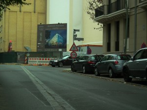 The line of the Wall in the foreground, the new city its demise created in the background